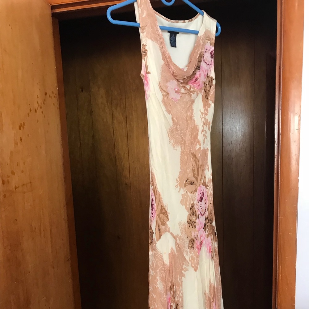 A white floral patterned dress with brown and pink